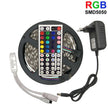 LED Strip Light featuring a vibrant RGB color remote and power adapter for flexible installation.