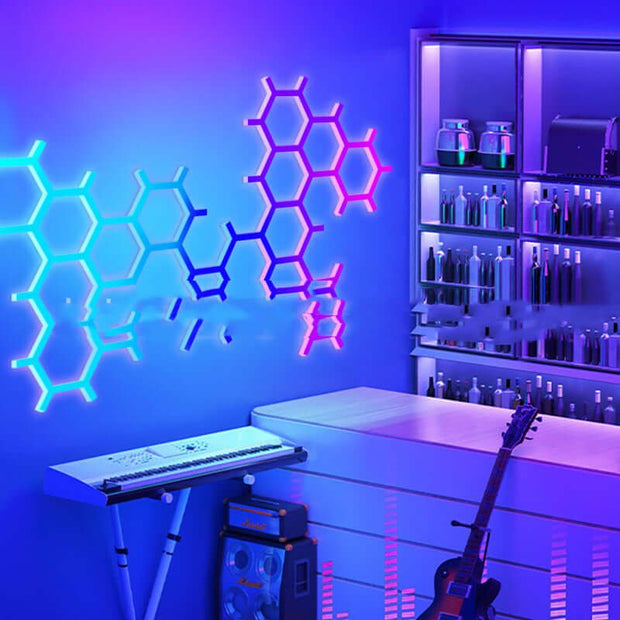 RGB Colourful ambience light illuminating a modern space with honeycomb wall design and musical elements.