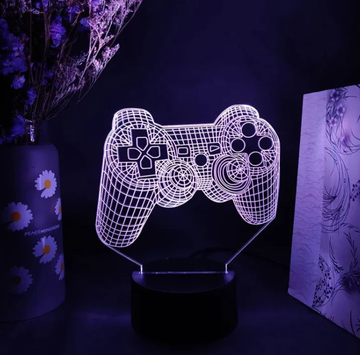 Colour-Changing LED Lightof a wireframe game controller lamp in a dark setting.