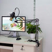 Net microphone stand set with BM-800 microphone attached to adjustable arm next to a computer monitor and plant.