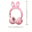 Charming Bunny Ear Headphones with cute rabbit ears and soft pink design for kids, featuring wireless Bluetooth connectivity.