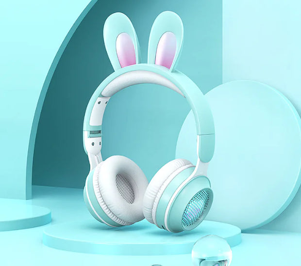 Charming Bunny Ear Headphones in pastel blue with rabbit ears and cute design for kids.