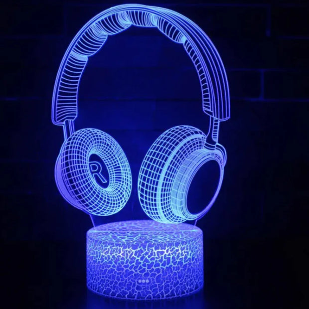 Colour-Changing LED Light in the shape of headphones with a vibrant blue glow, perfect for modern decor.