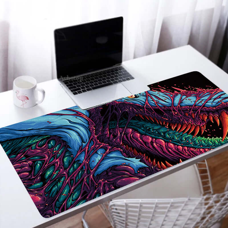 Custom Large Gaming Mouse Pad featuring a colorful and detailed dragon design on a desk with a laptop.