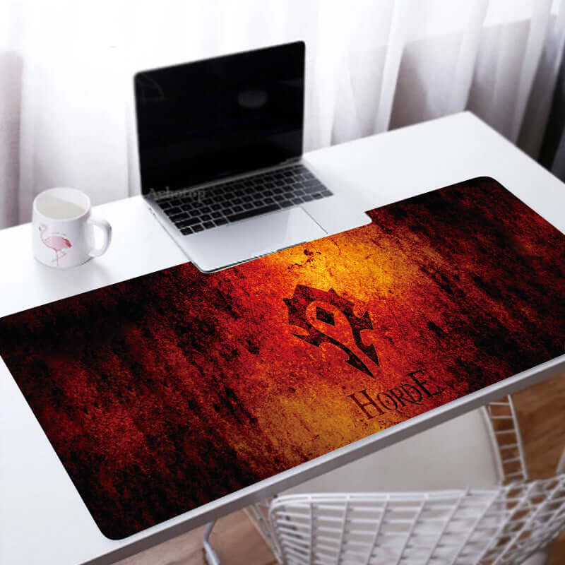 Custom Large Gaming Mouse Pad featuring Horde design on a desk with a laptop and mug.