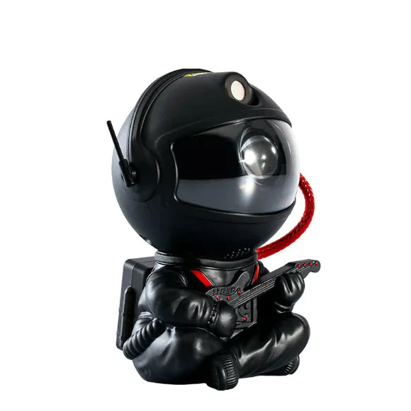 Cute astronaut galaxy projector designed to create a dreamy starry night light ambiance in any room.