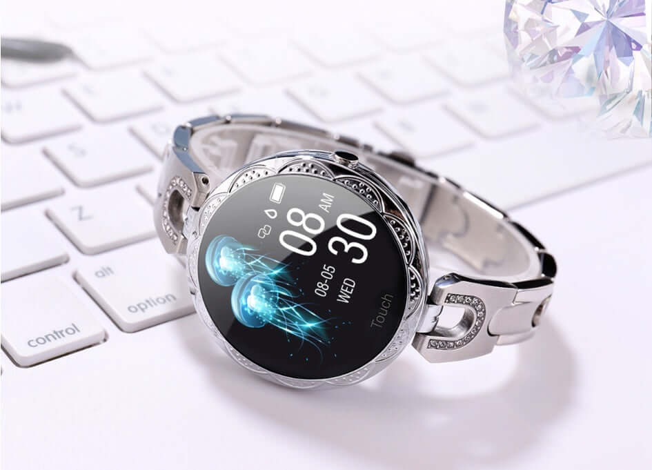 Fashionable Women's Smart Watch displayed on a keyboard with a sleek design and vibrant HD display.