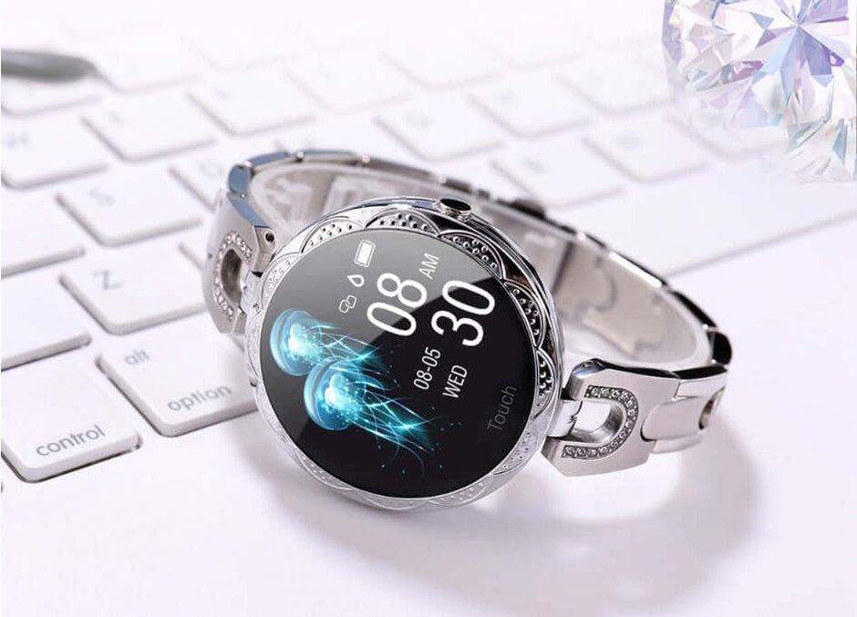 Fashionable Women's Smart Watch displayed on a keyboard with a sleek design and vibrant HD display.