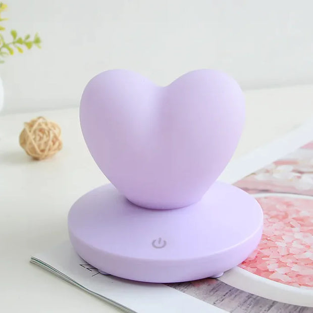 GlowTouch Desk Lamp in heart shape, providing soft illumination and modern style for any space.