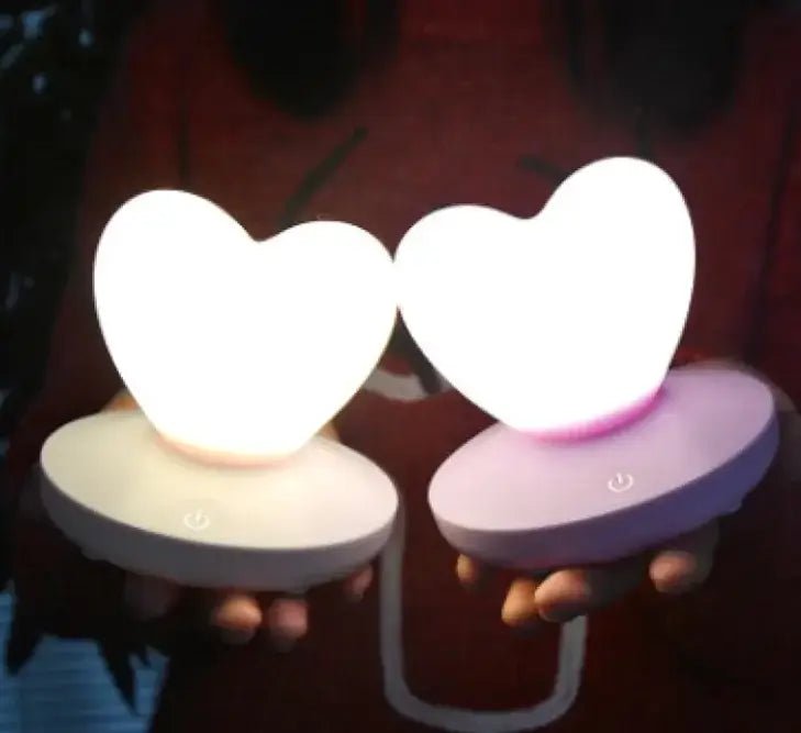 GlowTouch Desk Lamp, heart-shaped touch lamps offering soft illumination and modern style in a cozy setting.
