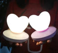 GlowTouch Desk Lamp, heart-shaped touch lamps offering soft illumination and modern style in a cozy setting.