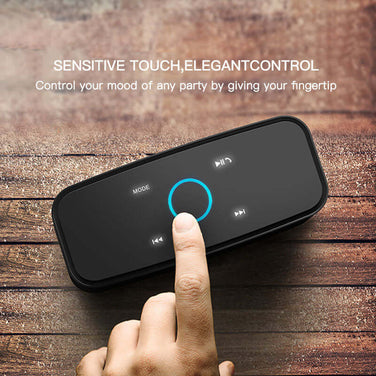 Home Touch Button Portable Bluetooth Speaker with touch controls on a wooden surface.