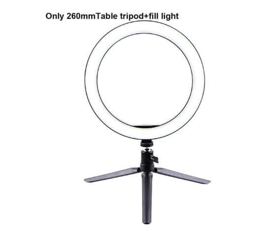 LED Ring Light on a table tripod, providing soft illumination for photography and video calls.