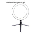 LED Ring Light on a table tripod, providing soft illumination for photography and video calls.
