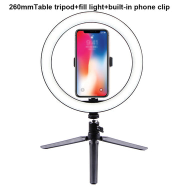 LED Ring Light with phone clip on tripod for enhanced lighting during video calls and photography.