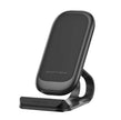 Mobile phone wireless charger in sleek black design for convenient wireless charging.