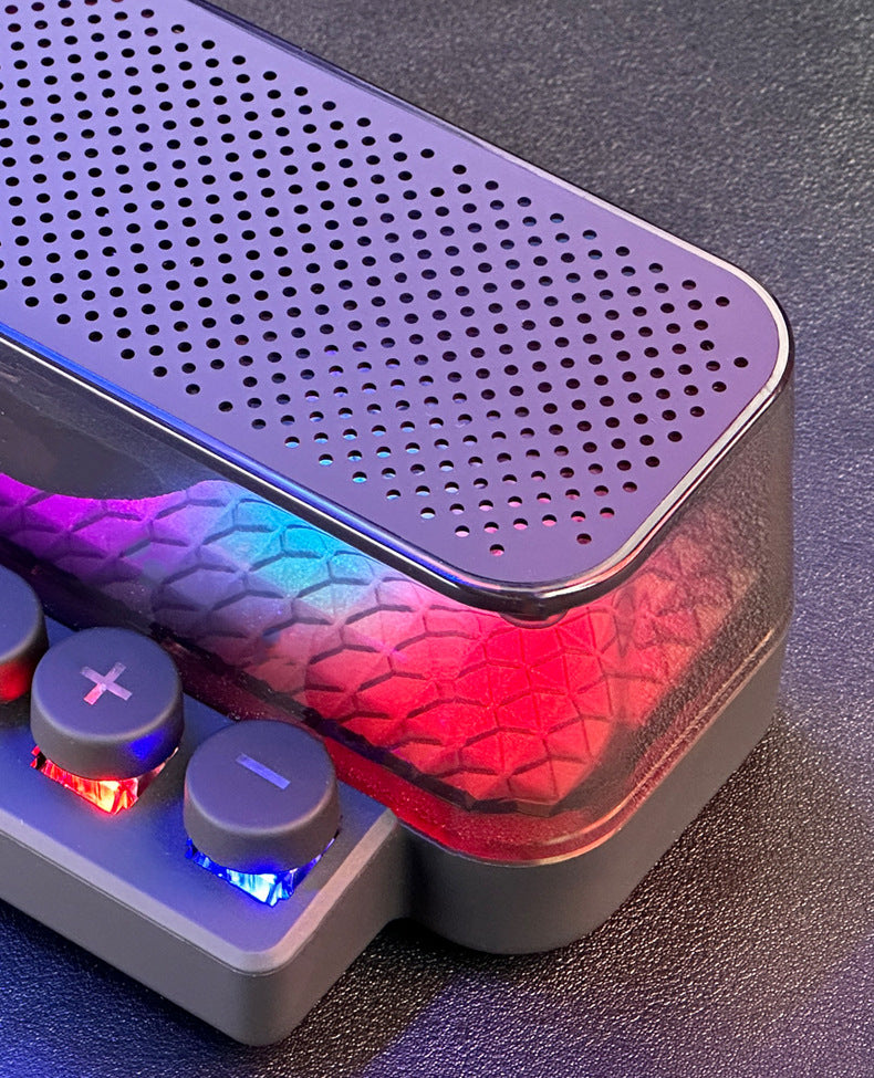 Vibrant Sound Keyboard compact speaker with built-in lighting and audio controls on a stylish background.