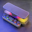 Vibrant Sound Keyboard showcasing colorful lighting and compact design, perfect for desktops and portable use.