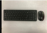 Wireless Keyboard and Mouse Set positioned on a clean surface, showcasing the sleek black design.